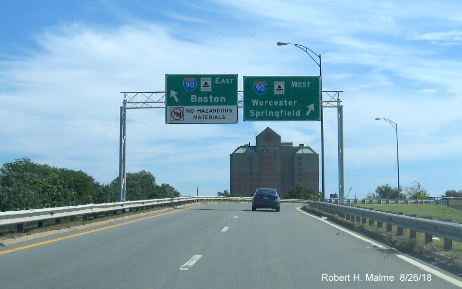 Image of new overhead guide signs at split of ramps to I-90/Mass Pike East and West from Cambridge St in Brighton