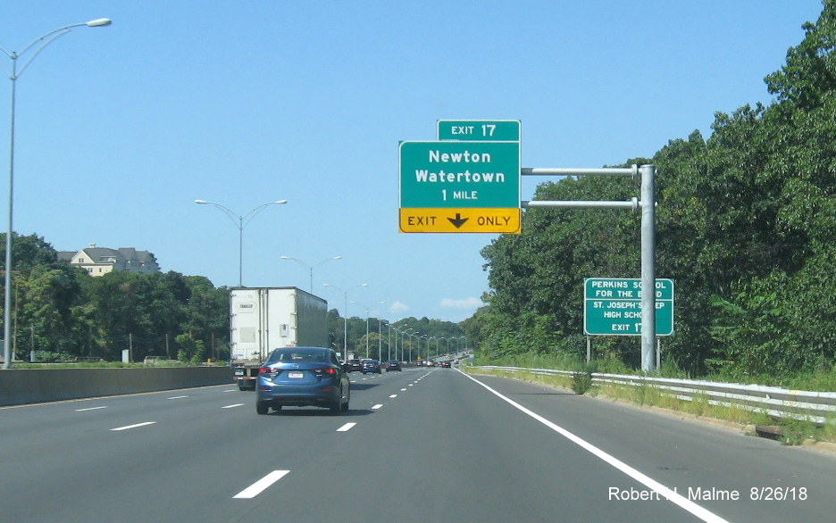 Image of new 1-mile advance overhead sign with Exit Only banner for Newton/Watertown exit on I-90/Mass Pike in Newton
