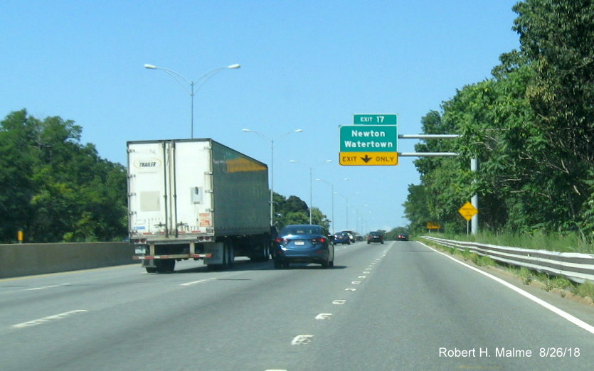 Image of 1/2 mile advance (without distance) overhead sign for Newton/Watertown exit on I-90/Mass Pike West
