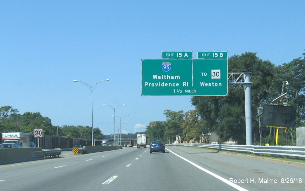 Image of newly placed 1 1/2 mile advance signs for I-95 and MA 30 exits on I-90/Mass Pike West in Newton