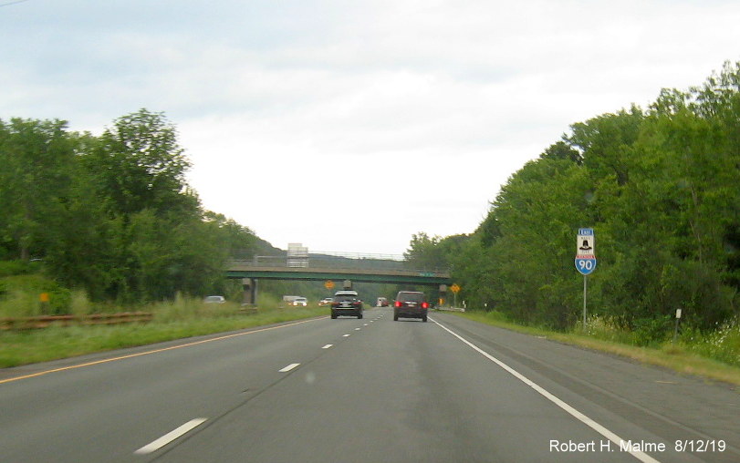 Image of recently placed wrong ordered East I-90/Mass Pike reassurance marker (no longer follows order on pull through signs) after US 20 exit in Lee