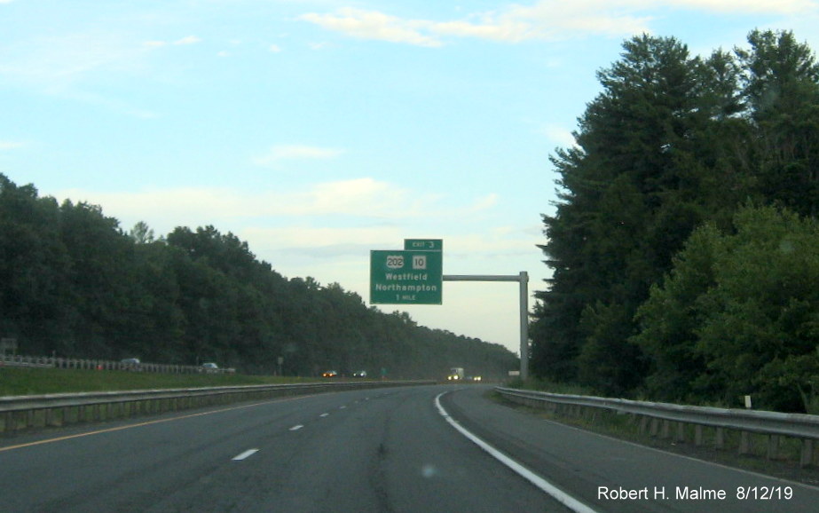 Image of recently placed 1 mile advance overhead sign for MA 10/US 202 exit on I-90/Mass Pike East in Westfield