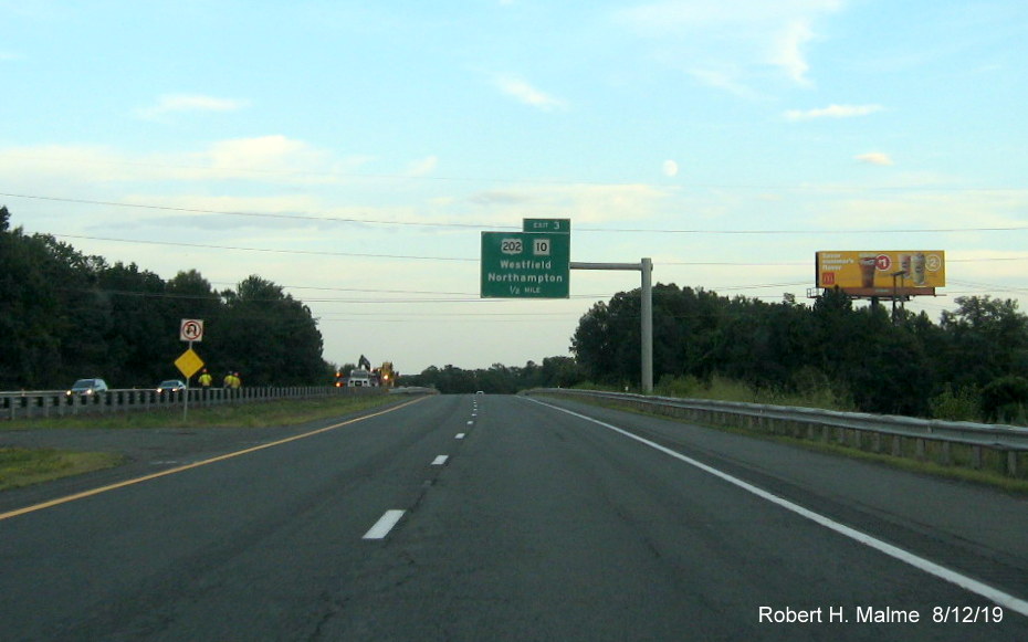 Image of recently installed 1/2 mile advance overhead sign for US 202/MA 10 exit on I-90/Mass Pike in Westfield in Aug. 2019