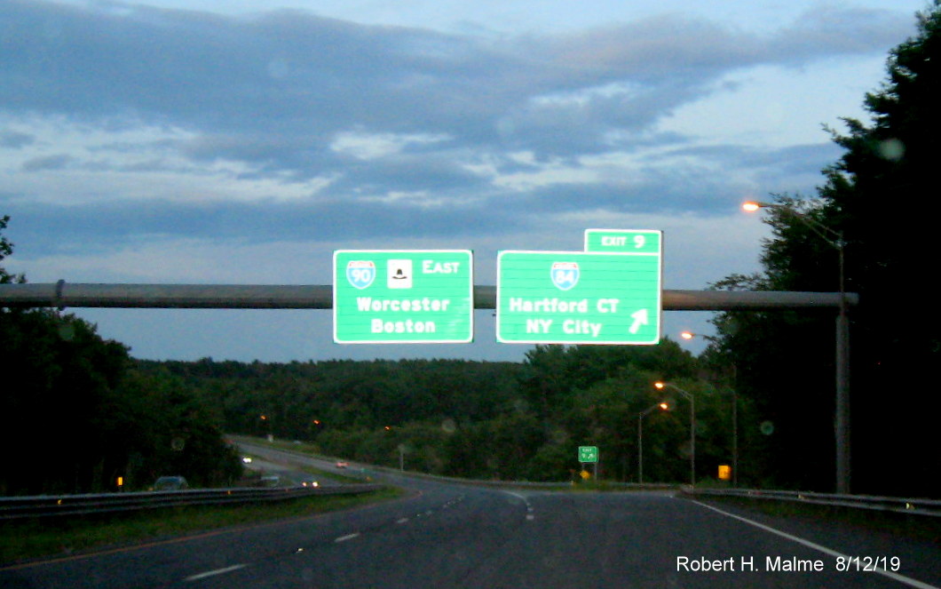 Image of recently placed overhead signage at ramp to I-84 (West) on I-90/Mass Pike East in Sturbridge in Aug. 2019