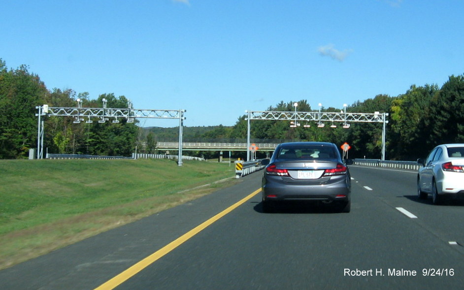 Image of overhead gantry for electronic tolls over I-90/Mass Pike in Lee