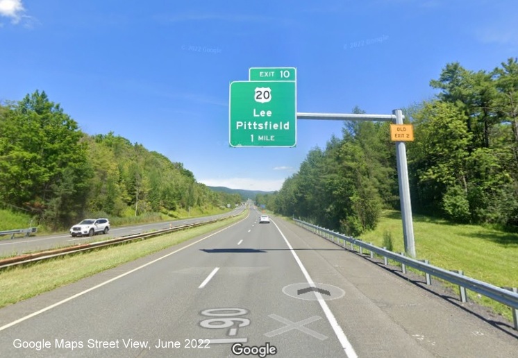 Image of 1 mile advance overhead sign for US 20 exit with new milepost based exit number and yellow Old Exit 2 advisory sign on top of sign support post on I-90/Mass Pike East in Lee, Google Maps Street View image, June 2022