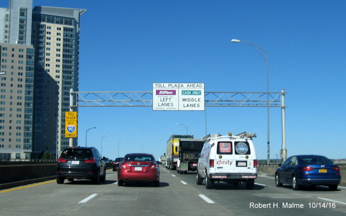 Image of soon to be taken down Toll Plaza Ahead sign on I-90 West in Boston