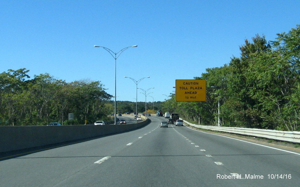 Image of soon to be taken down Toll Plaza 1/2 Mile Warning sign on I-90 West in Newton