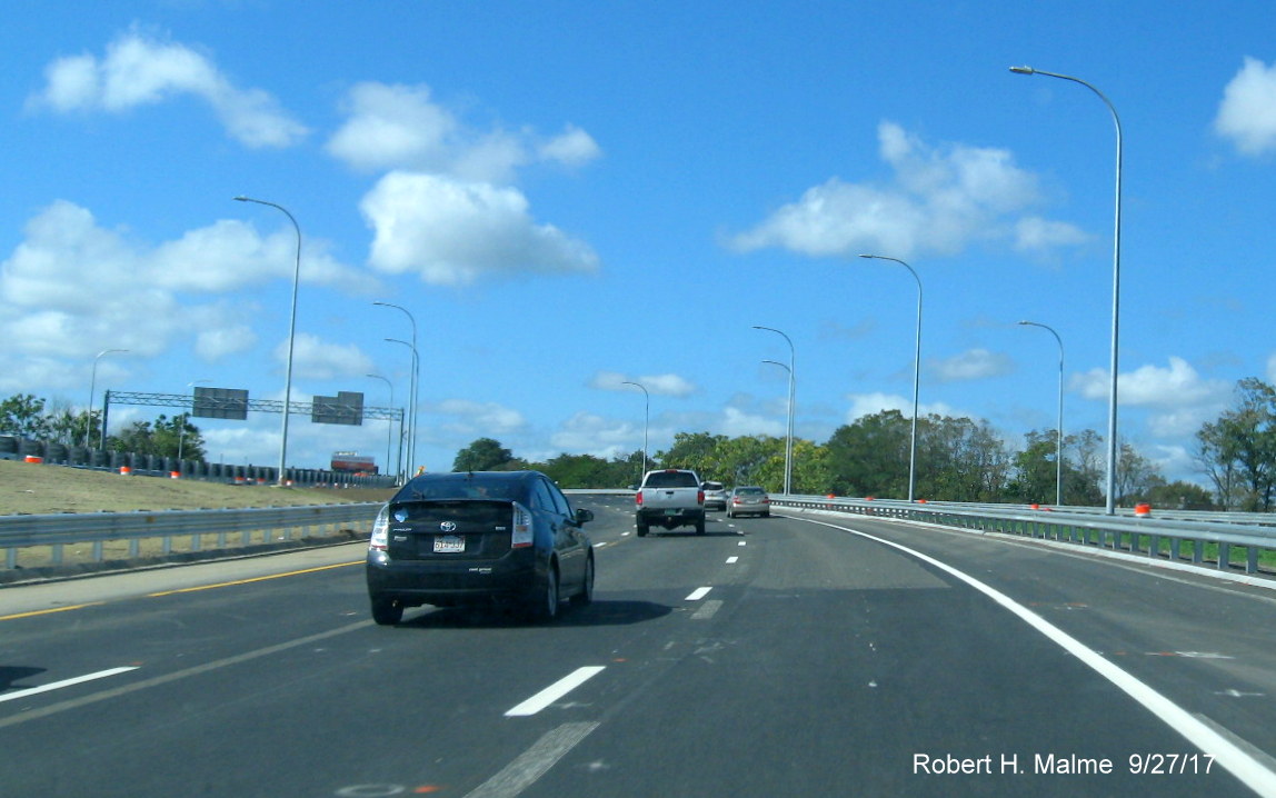 Image of I-90/Mass Pike traffic approaching on-ramp after former site of Allston-Brighton toll plaza