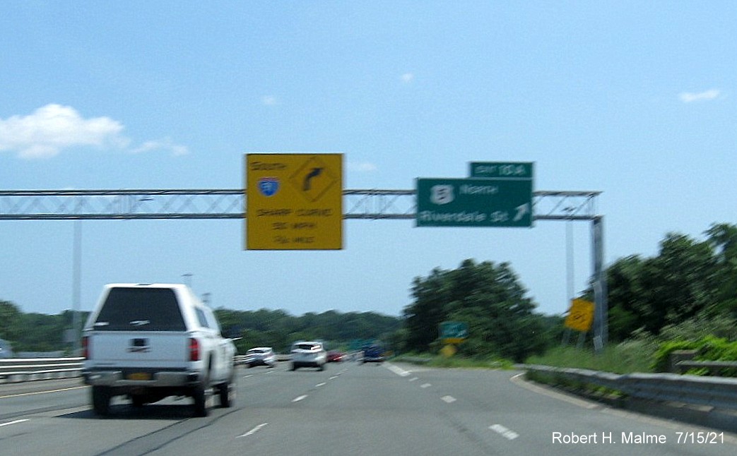 Image of overhead ramp signs for US 5 exits with new milepost based exit numbers on I-91 South in West 
                                         Springfield, July 2021