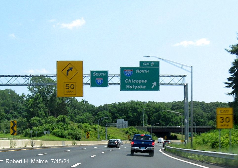 Image of overhead ramp sign for I-391 North exit with new milepost based exit number on I-91 South in 
                                         West Springfield, July 2021
