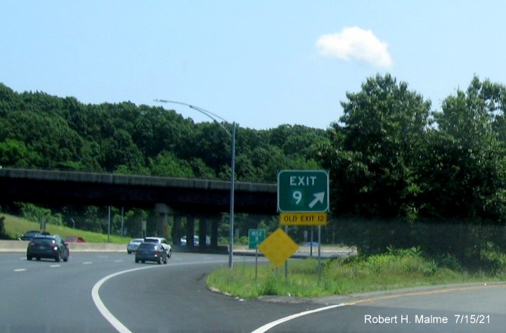 Image of gore sign for I-391 North exit with new milepost based exit number and yellow Old Exit 12 sign attached below on I-91 South in 
                                         West Springfield, July 2021