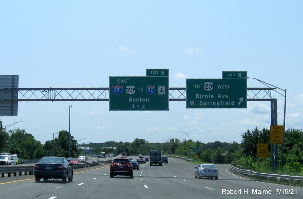 Image of overhead ramp sign for Birnie Avenue exit with new milepost based exit number on I-91 South 
                                         in West Springfield, July 2021