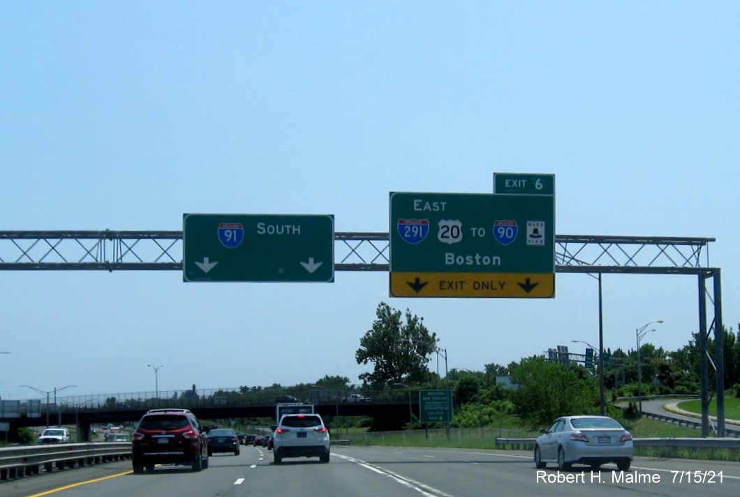 Image of brown auxiliary for Hall of Fame Blvd and Union Street exits with new milepost based exit numbers on I-91 South in Springfield, July 2021
