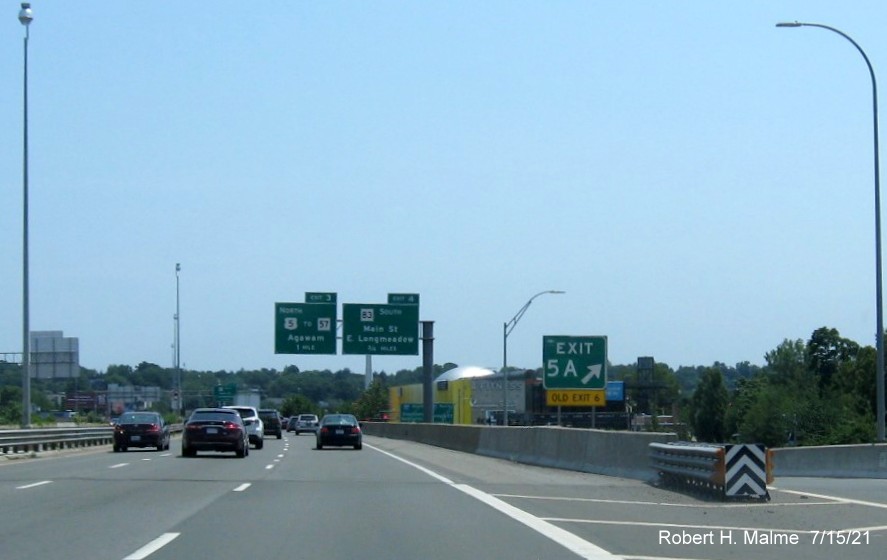 Image of gore sign at ramp for Union Street/MGM Way exit with new milepost based exit number and yellow Old Exit 6 sign attached below on I-91 South in Springfield, July 2021