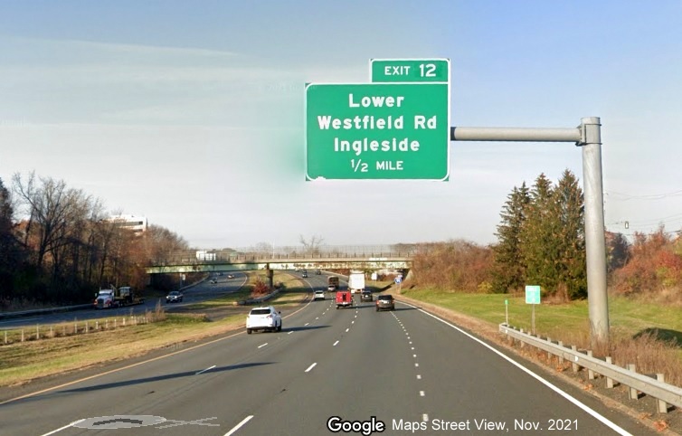 Image of 1/2 mile advance overhead sign for Lower Westfield Road with new milepost based exit number on I-91 North in Holyoke, Google Maps Street View image, November 2021