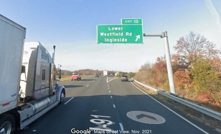 Image of overhead ramp sign for Lower Westfield Road with new milepost based exit number on I-91 North in Holyoke, Google Maps Street View image, November 2021