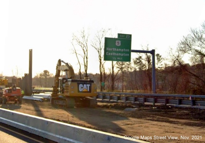 Image of 1/2 mile advance overhead sign for US 5 exit with new milepost based exit number on I-91 South in Northampton, Google Maps Street View image, November 2021