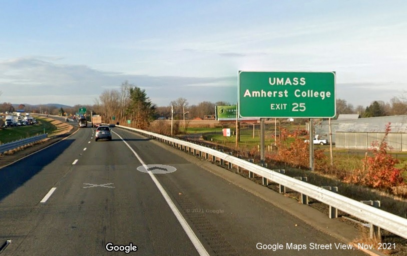 Image of auxiliary sign for UMass Amherst on MA 9 exit with new milepost based exit number on I-91 North in Amherst, Google Maps Street View image, November 2021