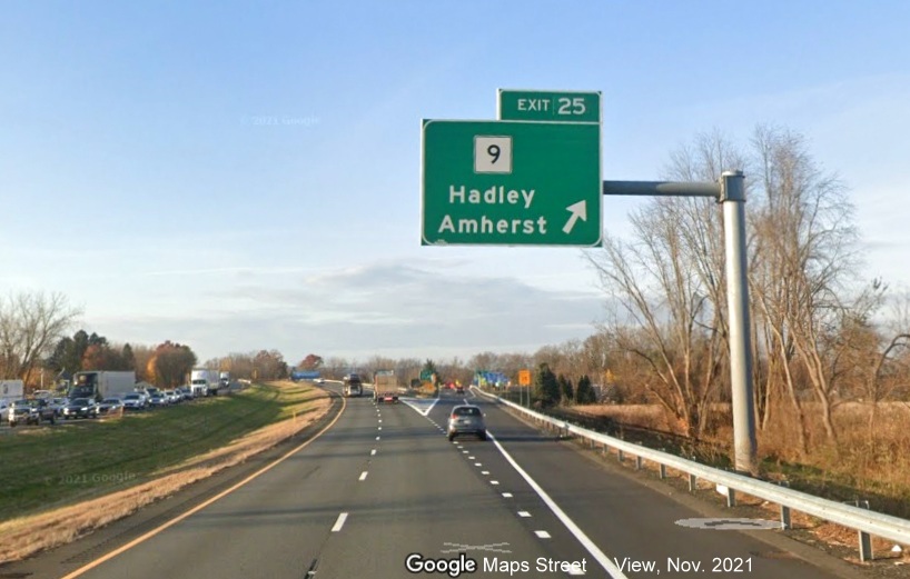 Image of overhead ramp sign for MA 9 exit with new milepost based exit number on I-91 North in Amherst, Google Maps Street View image, November 2021
