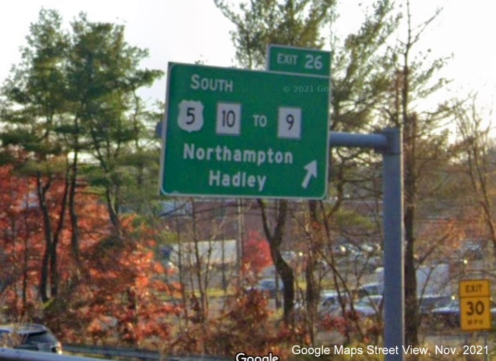 Image of overhead ramp sign for South US 5/MA 10 to MA 9 exit with new milepost based exit number on I-91 South in Amherst, Google Maps Street View image, November 2021