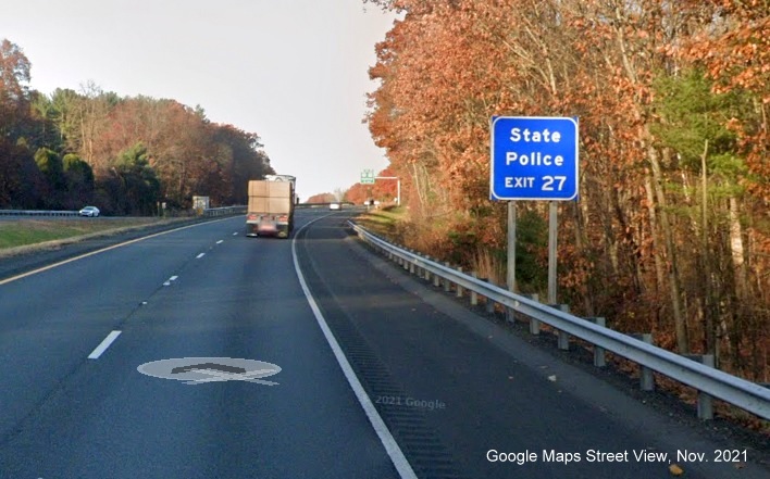 Image of blue State Police sign for US 5/MA 10 exit with new milepost based exit number on I-91 North in Hatfield, Google Maps Street View image, November 2021