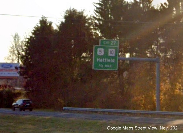 Image of 1/2 mile advance overhead sign for US 5/MA 10 exit with new milepost based exit number on I-91 South in Hatfield, Google Maps Street View image, November 2021