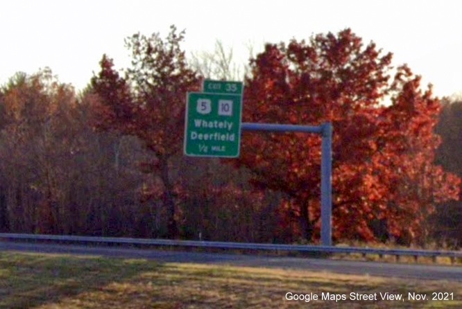 Image of 1/2 mile advance overhead sign for US 5/MA 10 to MA 116 exit with new milepost based exit number on I-91 South in Deerfield, Google Maps Street View image, November 2021