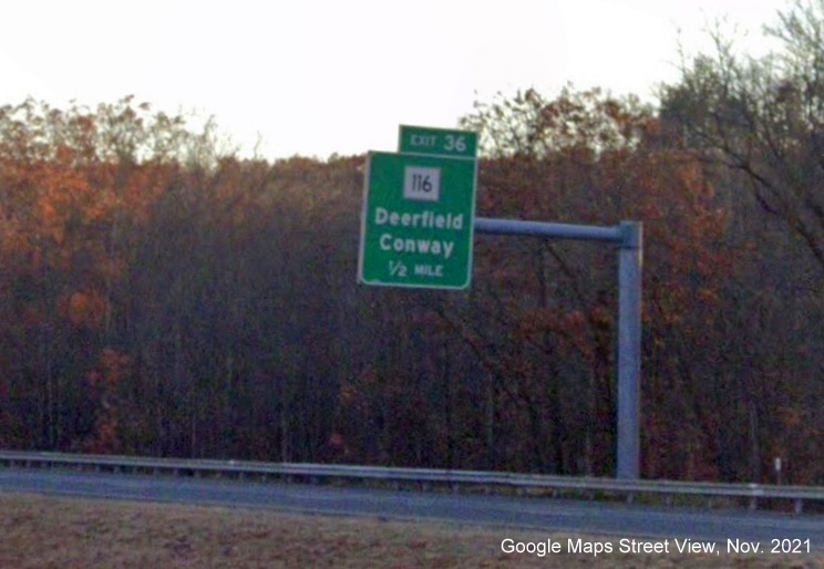 Image of 1/2 mile advance overhead sign for MA 116 exit with new milepost based exit number on I-91 South in Deerfield, Google Maps Street View image, November 2021