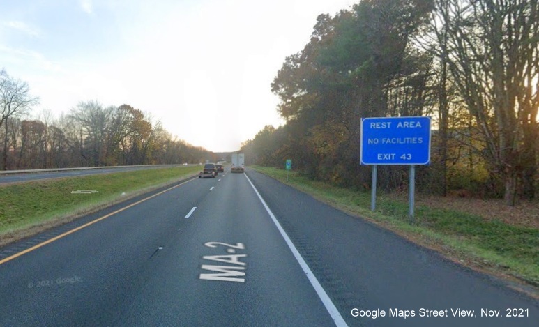 Image of ground mounted rest area sign for MA 2 West/MA 2A East exit with new milepost based exit number on I-91 South in Greenfield, Google Maps Street View image, November 2021