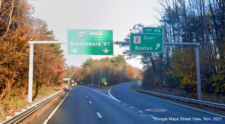 Image of overhead ramp sign for MA 2 East exit with new milepost based exit number on I-91 North in Greenfield, Google Maps Street View image, November 2021