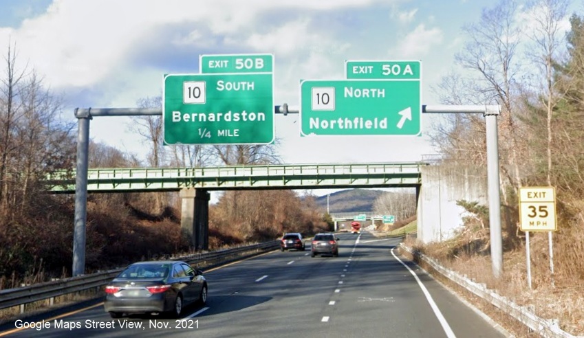 Image of overhead signage at ramp for MA 10 North exit with new milepost based exit number on I-91 North in Bernardston, Google Maps Street View image, November 2021 