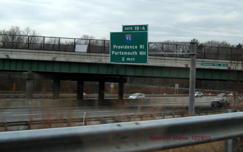 Image of newly revised 2 Mile I-95 Sign, now with exit ramp suffixes on I-93 North in Randolph