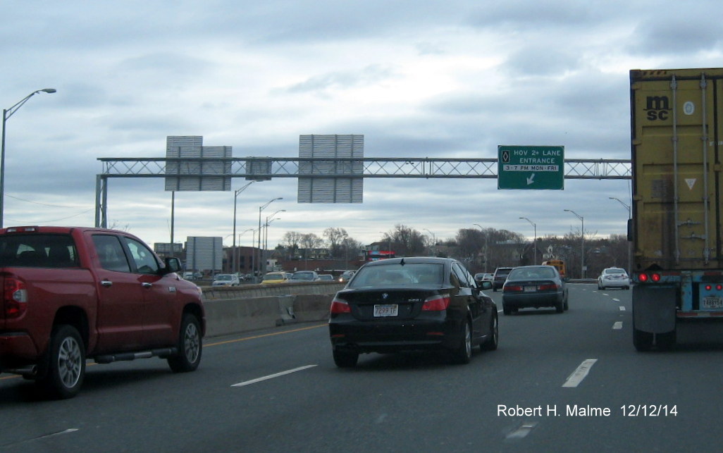 Left-hand overhead Advisory Sign for HO lane entrance put up on I-93 South in Boston in Nov. 2014