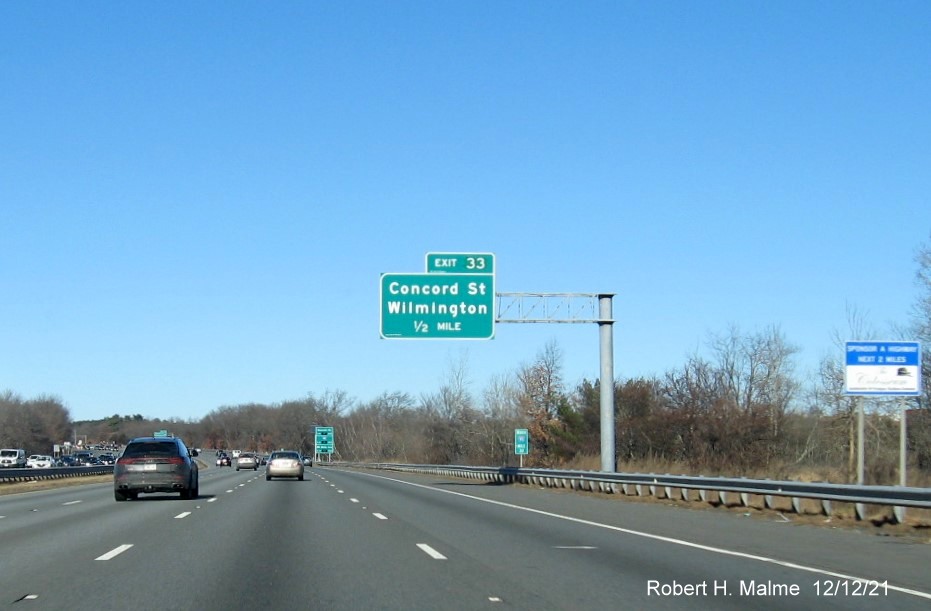 Image of 1/2 mile advance overhead sign for Concord Street exit with new milepost based exit number on I-93 North in Wilmington, by Vinh Lam, May 2021