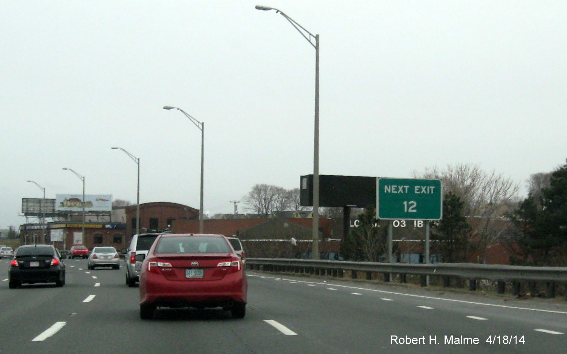 Image of Next Exit 13 sign on I-93 North in Boston