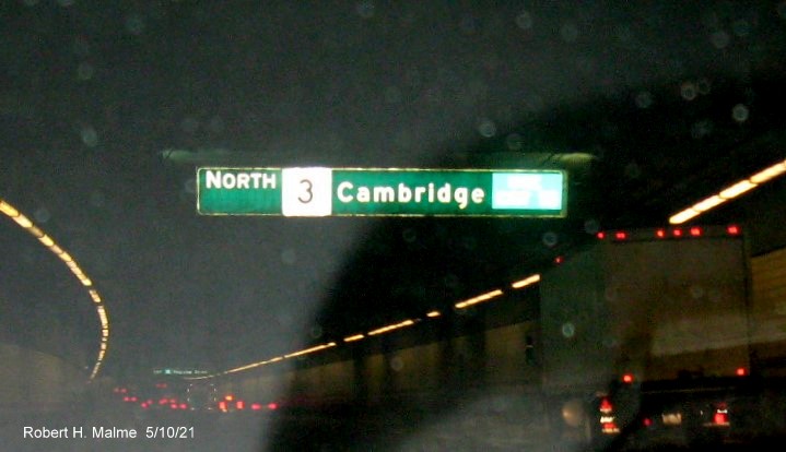 Image of auxiliary signs for Storrow Drive exit with new milepost based exit number on I-93 North in Boston, May 2021