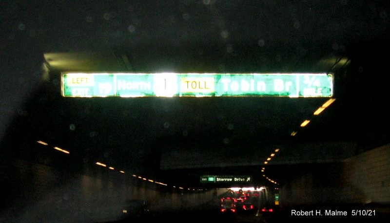 Image of advance signs for Storrow Drive exit with new milepost based exit number on I-93 North in Boston, May 2021