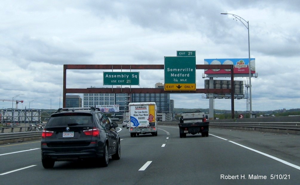 Image of 3/4 Mile advance overhead sign for MA 28/38 exit with new milepost based exit number on I-93 North in Somerville, May 2021