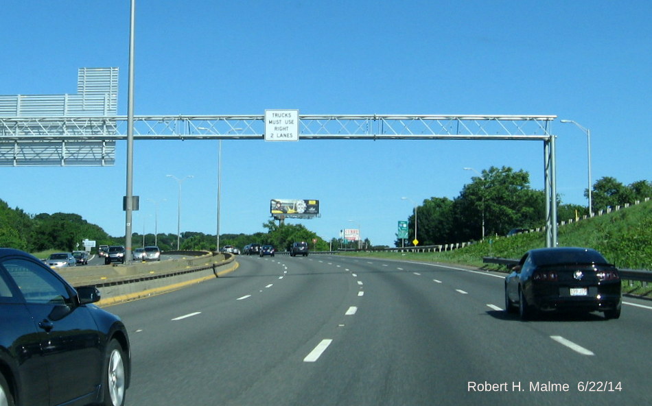 Image of truck exlusion sign on northbound side of support for overhead sign for Exit 7 on I-93 South in Quincy