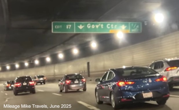 Image of overhead 1/4 mile advance sign for Government Center exit with new 
	milepost based exit numbers on I-93 North in Boston, video capture from Mileage Mile Travels, June 2025