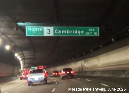 Image of MA 3 auxiliary sign for Storrow Drive exit with milepost based exit number 
	on I-93 North in Boston, screen grab from Mileage Mile Travels video, June 2025