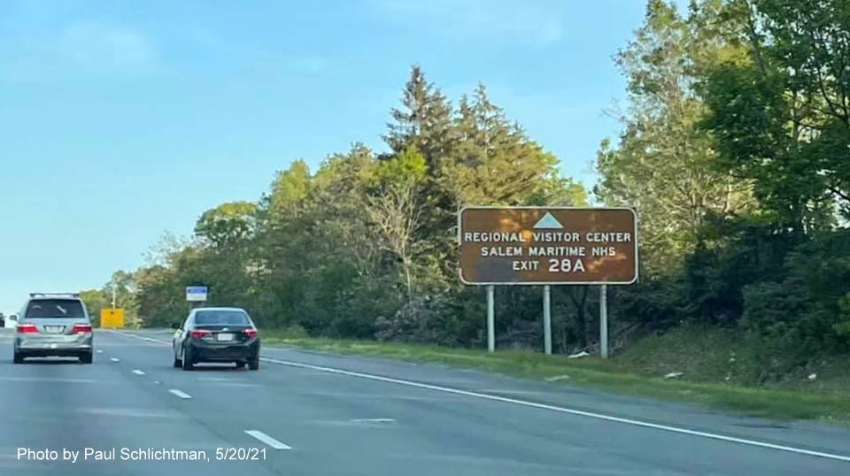 Image of brown attractions sign for I-95/MA 128 North exit with new milepost based exit number on I-93 South in Woburn, by Paul Schlichtman, May 2021