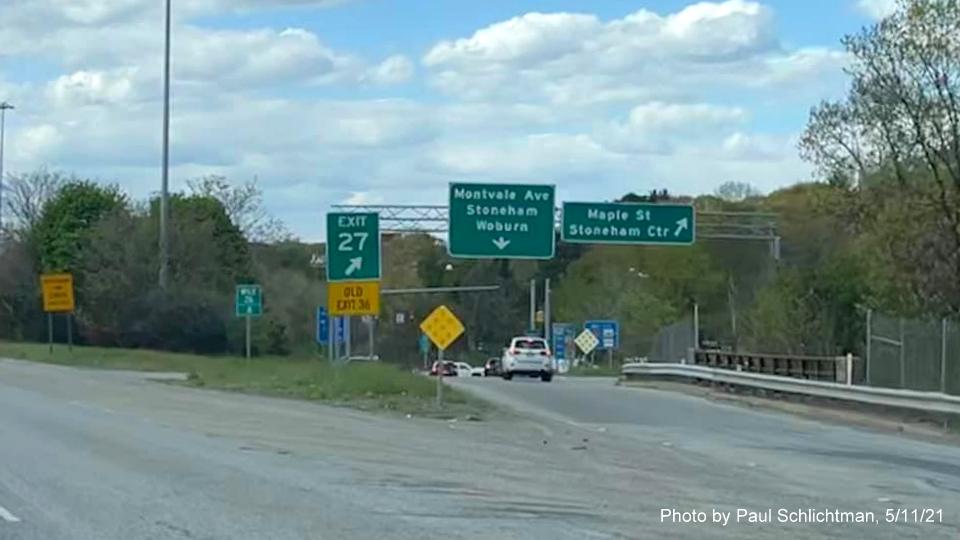 Image of gore sign for Montvale Avenue exit with new milepost based exit number and yellow Old Exit 36 sign attached below on I-93 North in Woburn, by Paul Schlichtman, May 2021