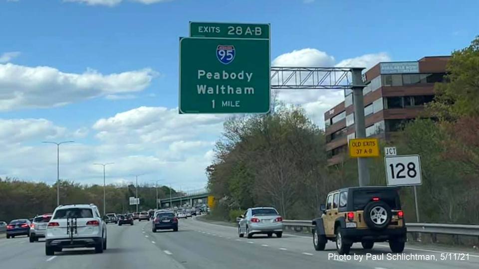 Image of 1 mile advance overhead sign for I-95 exits with new milepost based exit numbers and yellow Old Exits 37 A-B advisory sign on support on I-93 North in Woburn, by Paul Schlichtman, May 2021