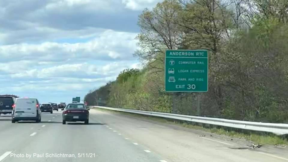 Image of auxiliary sign for Commerce Way exit with new milepost based exit number on I-93 North in Woburn, by Paul Schlichtman, May 2021