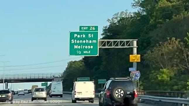 Image of 1/2 mile advance overhead sign for Park Street exit with new milepost based exit number and 
                                            yellow Old Exit 35 advisory sign on support on I-93 South in Woburn, by Paul Schlichtman, May 2021