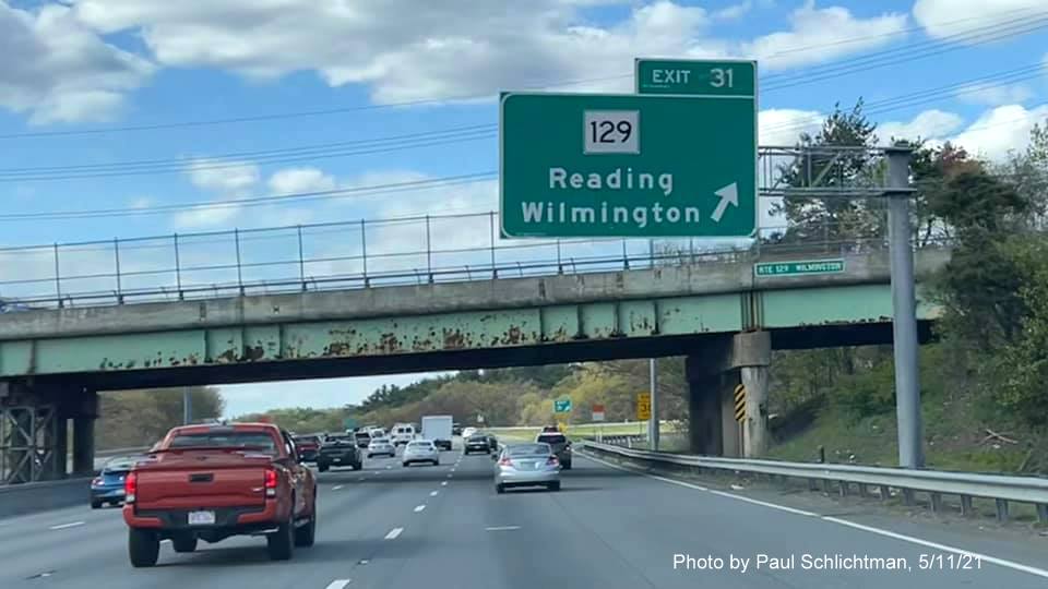 Image of overhead ramp sign for MA 129 exit with new milepost based exit number on I-93 North in Wilmington, by Paul Schlichtman, May 2021