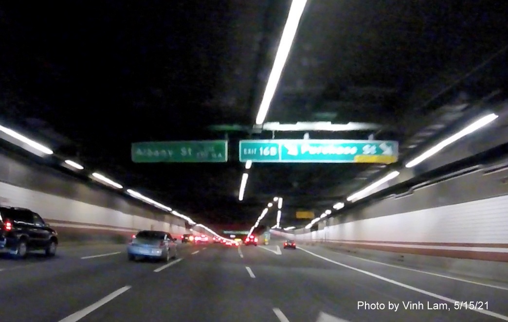 Image of overhead ramp tunnel ceiling mounted sign for Purchase Street exit with new milepost based exit number on I-93 South in Boston, by Vinh Lam, May 2021 