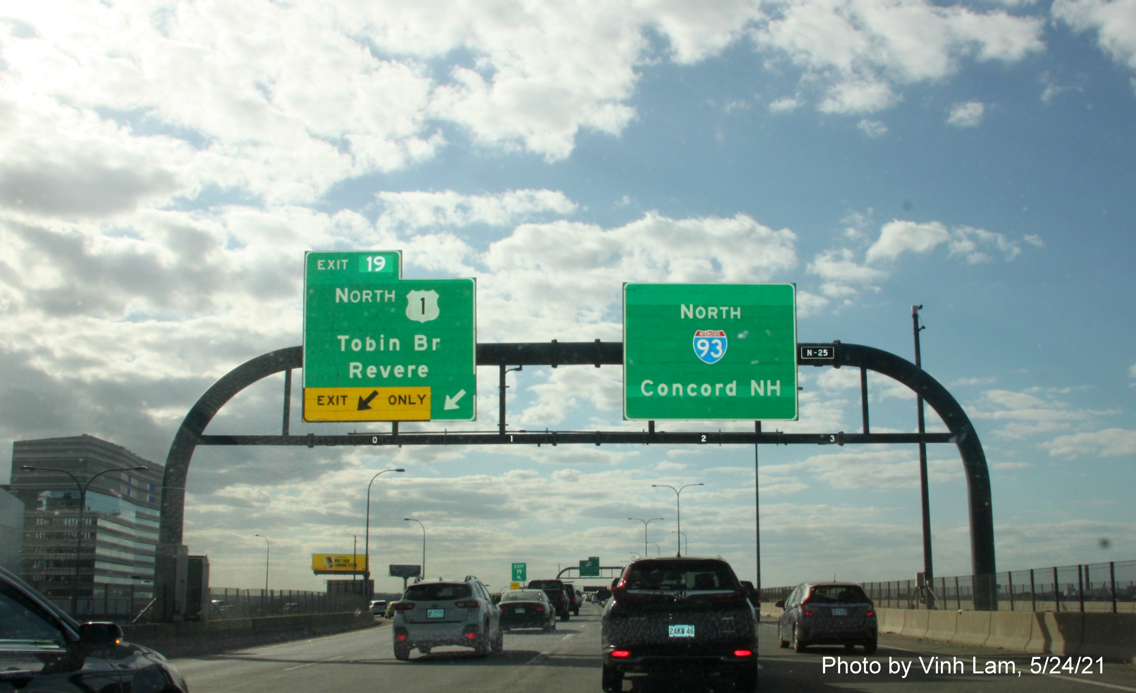 Image of overhead ramp sign for US 1/Tobin Bridge exit with new milepost based exit number on I-93 North in Charlestown, by Vinh Lam, May 2021